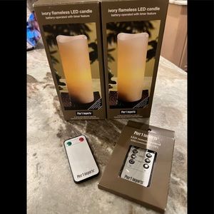 2 Pier 1 Ivory Flameless Candles with Remotes